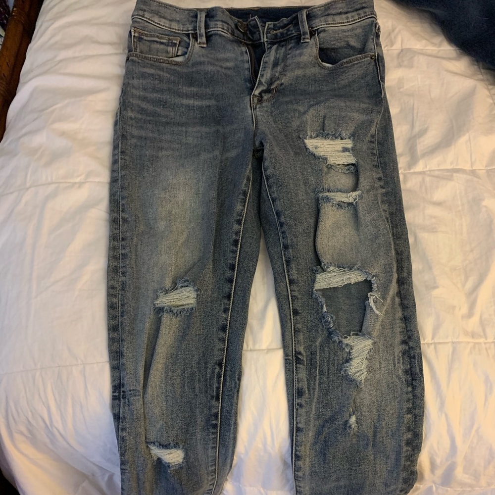 Dark blue faded, ripped, cut off/frilled jeans size 27 from urban outfitters